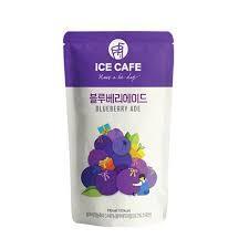 Ice cafe blueberry ade Dubai: Refreshing purple Korean pouch drink poured over ice in a chilled cup.