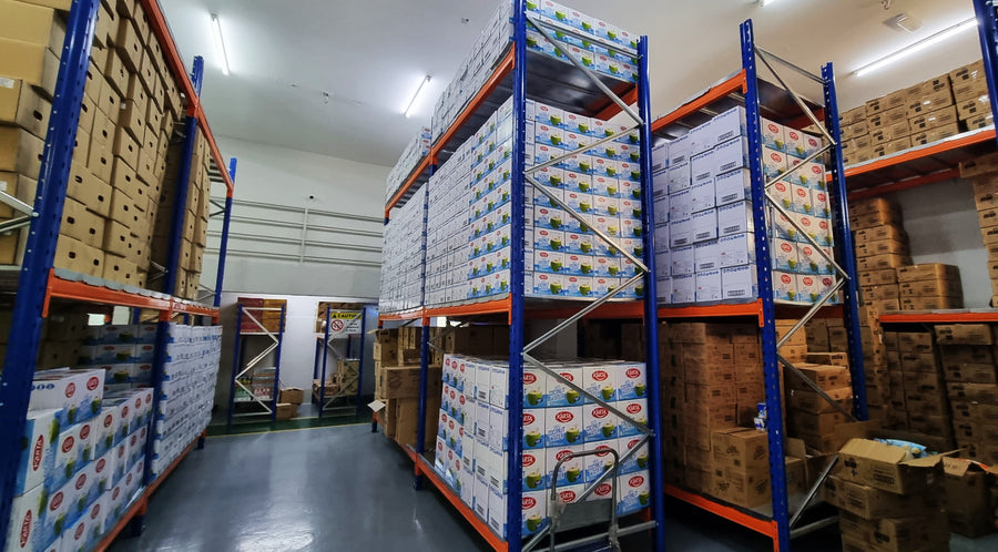 Cartons stacked on pallet racking inside the Seoul Oasis warehouse